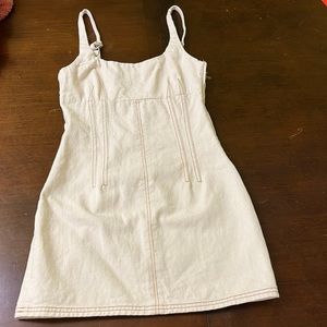 Cream with brown/dark orange stitching